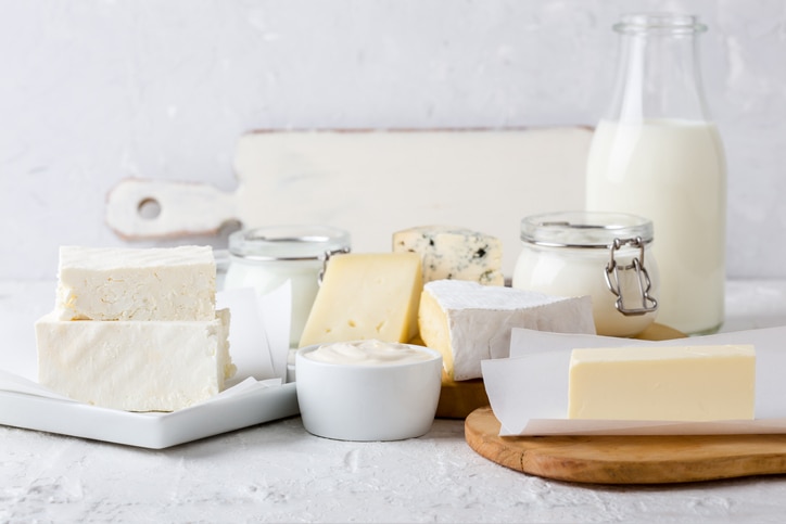 Fresh organic dairy products on white table