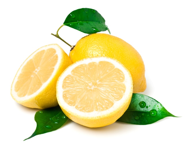 "Fresh lemon on white. This file is cleaned, retouched, contains"